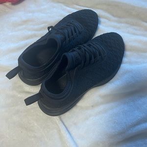 APL all black tennis shoes